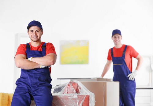 Commercial moving team planning a business relocation in Queens Park