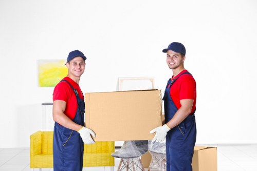 Unloading office items at a new workplace in Queens Park
