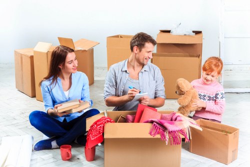 Man and van team preparing a local move in Queens Park