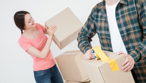 Furniture being carried through a typical Queens Park property