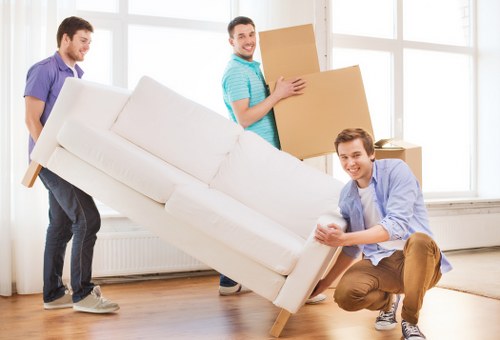 Careful loading of furniture during a Queens Park removal