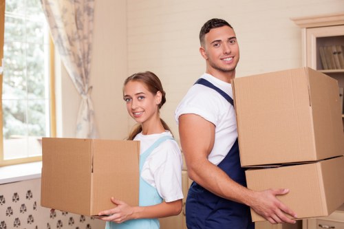 Boxes and furniture prepared for storage in a Queens Park property