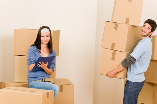 Prepared boxes and household items ready for moving day in Queens Park