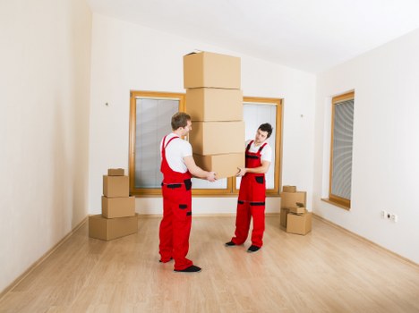 Local movers handling household items in Queens Park